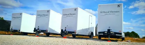 royal thrones restroom trailers at an event